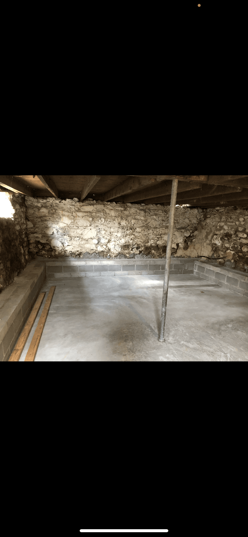 Finished basement with poured concrete floor