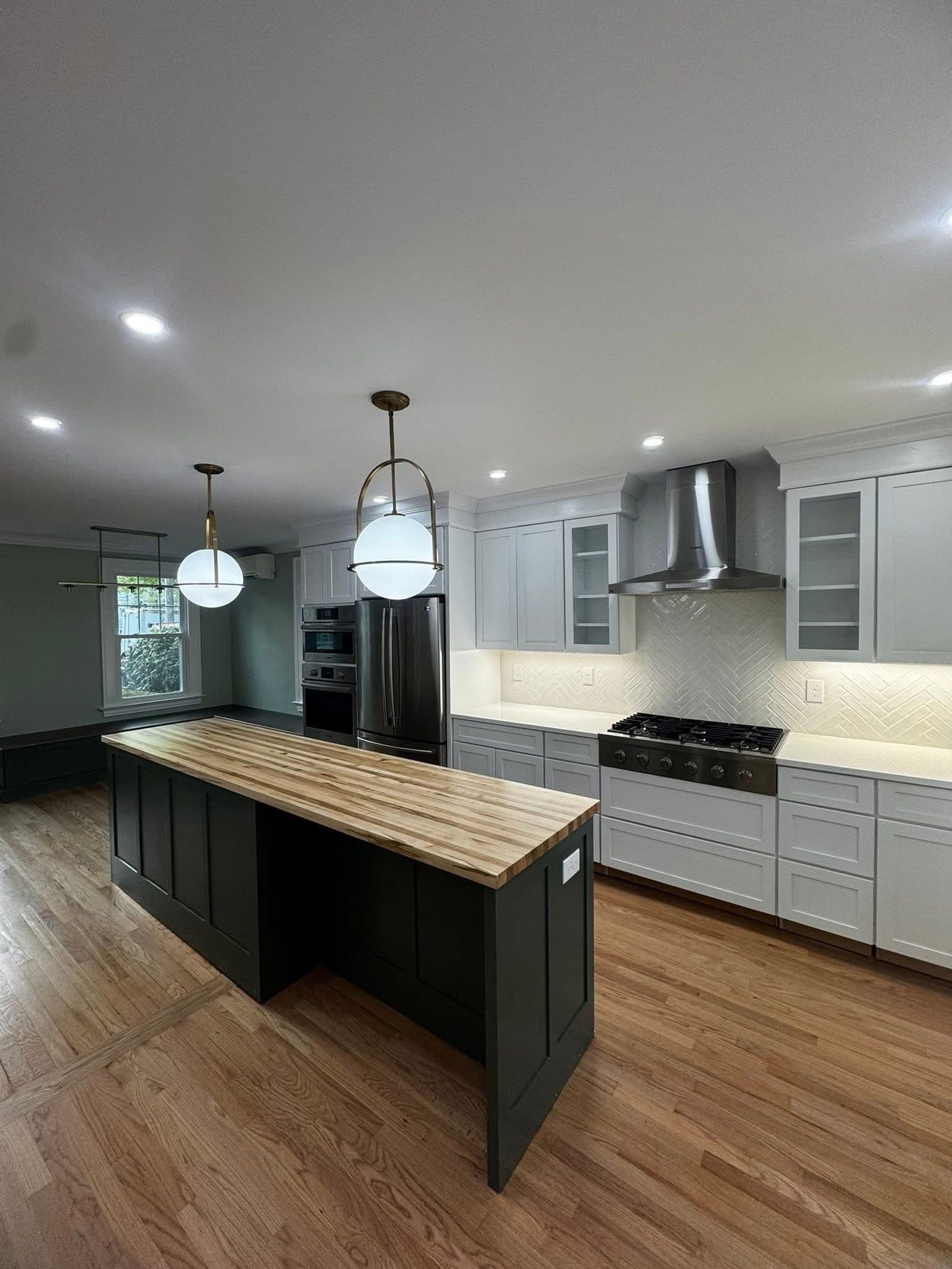 Full kitchen remodel with island and butcher block countertop